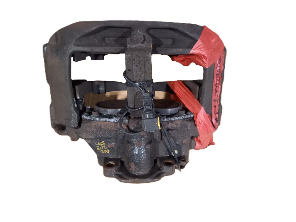 Zacisk hamulcowy przód lewy GC462B119ADN FORD OE